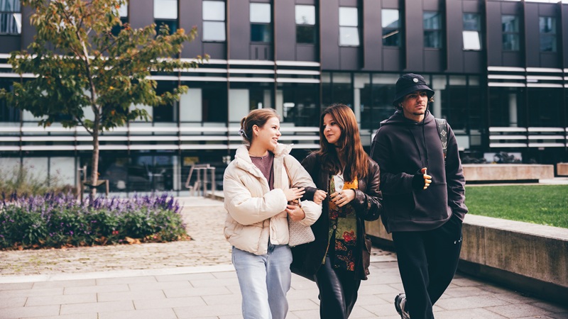 Students walking and talking outside
