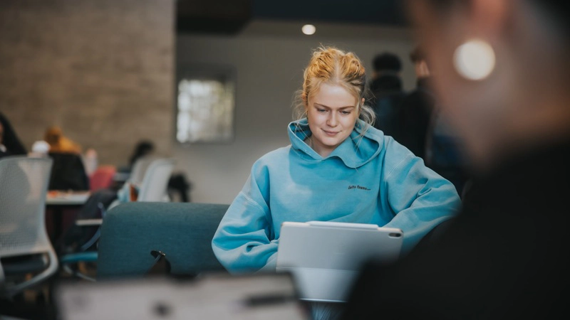Female student working on laptop