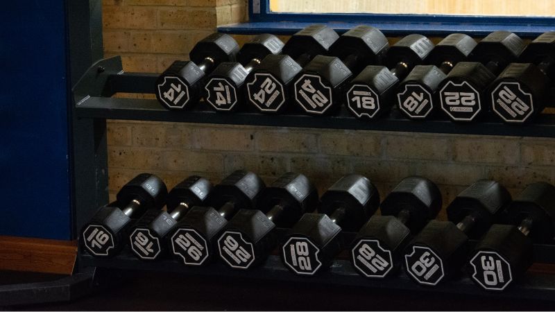 Dumbbells in gym