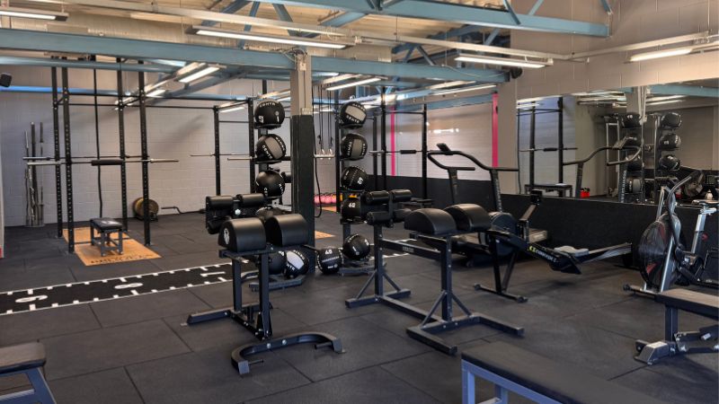 Downstairs gym with weights machines
