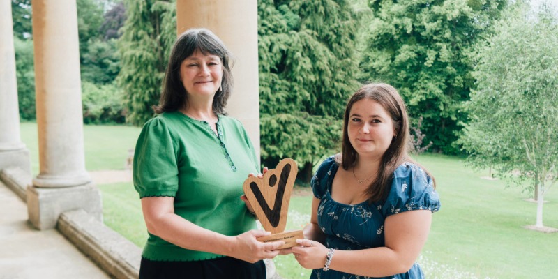 Lizzie Bowerman receives the Student Volunteer Award from Vice-Chancellor Professor Helen Laville