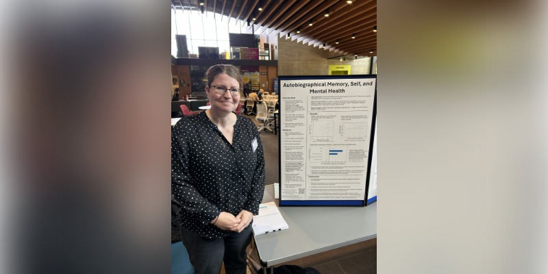 Jennifer Eloff with their poster