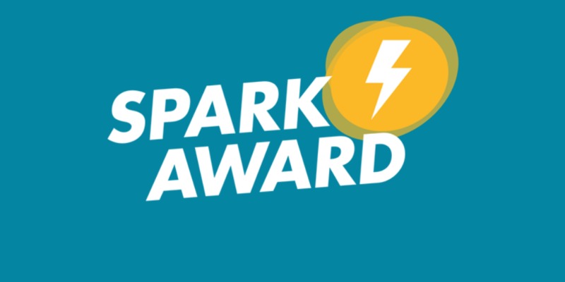 Spark Award logo with lightning bolt