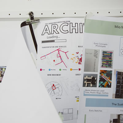 Architecture posters hung on a wall