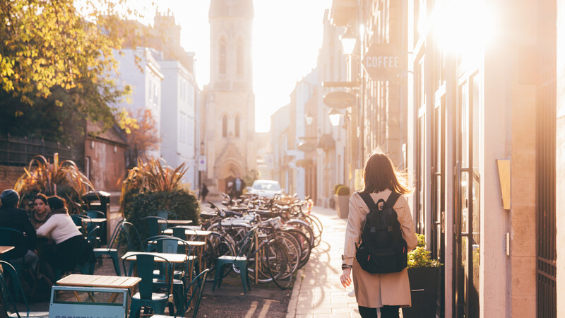 female student walking through Oxford