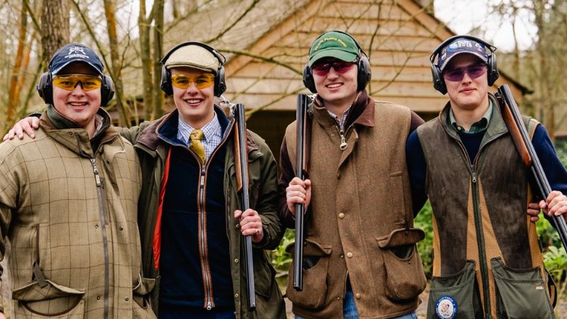Shooting club team picture at top of hill