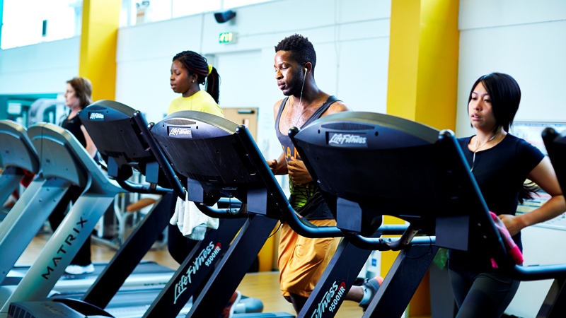 Gym user on treadmill