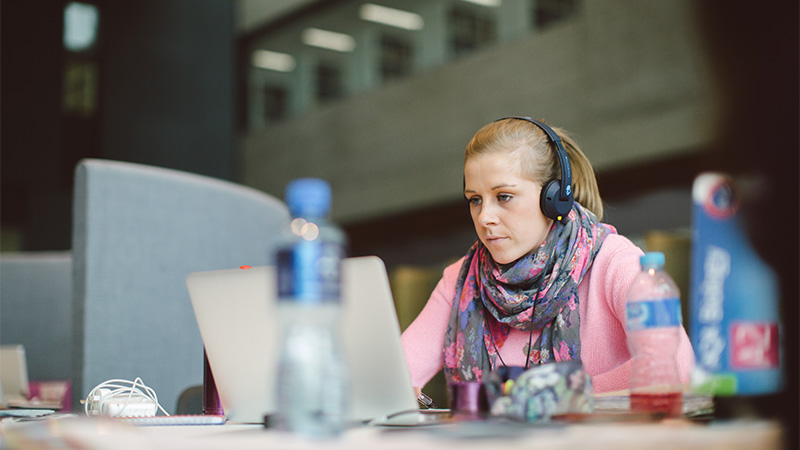 girl studying on a laptop