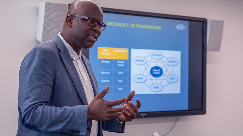 Lecturer explaning their research