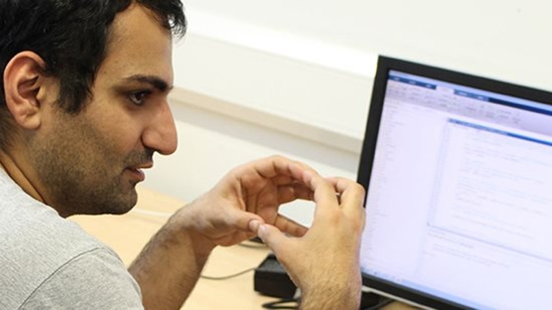Student looking at a laptop