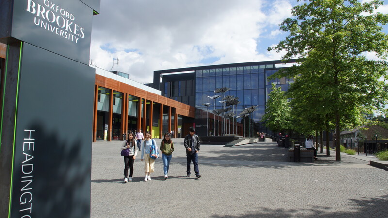 Students outside the John Henry Brookes Building
