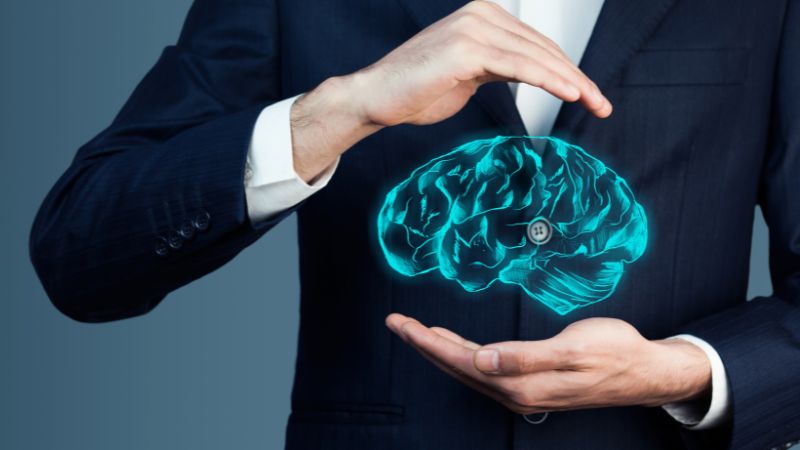 men in a suit with a projection human brain