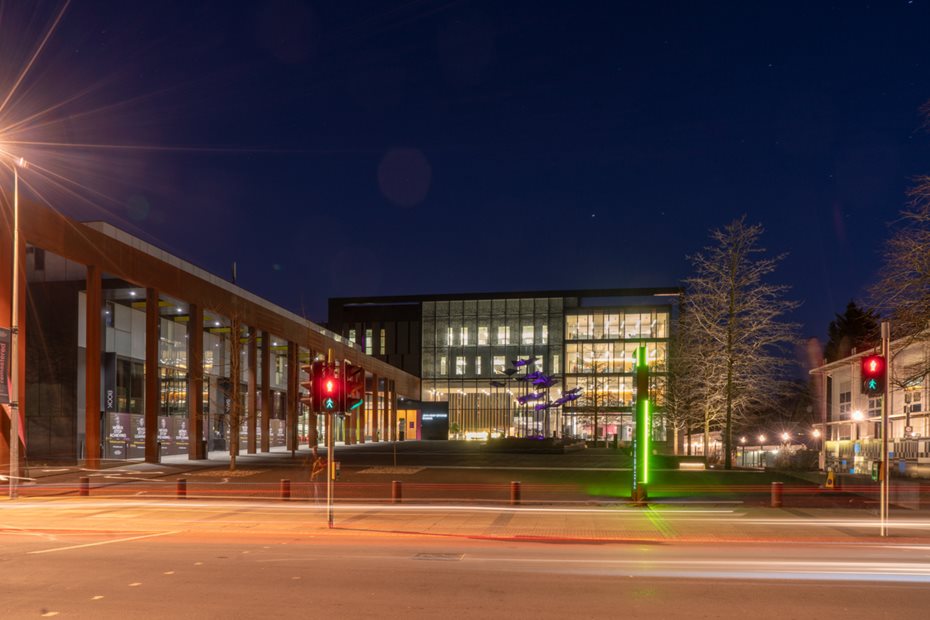 The piazza amd John Henry Brookes Building at Headington Campus as night