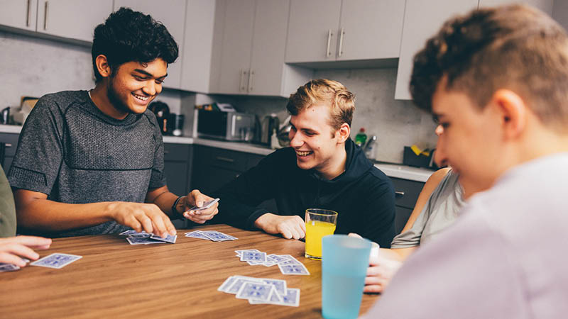 Students playing a card game