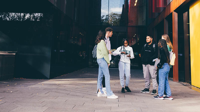 A group of students outside on-campus