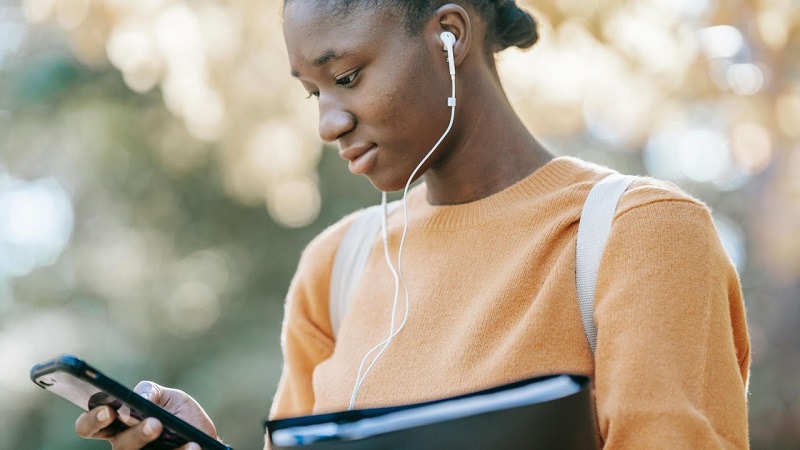 Student listening to a podcast