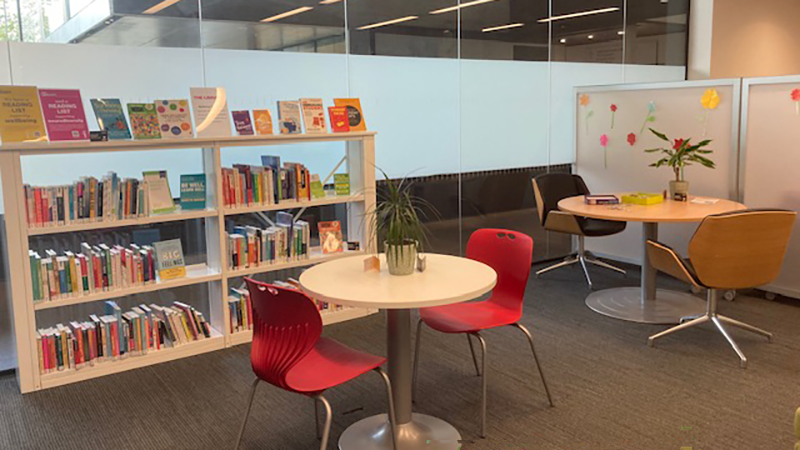 Headington Library JHBB wellbeing space with books, jigsaws, beanbag seating