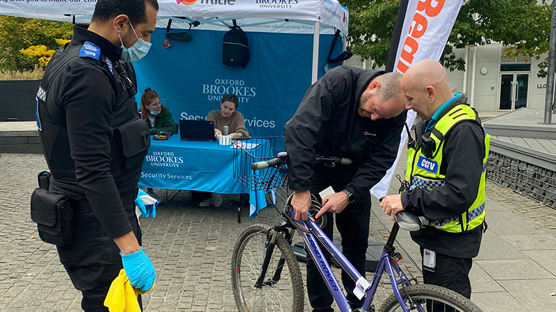 Police and Oxford Brookes security marking a bike