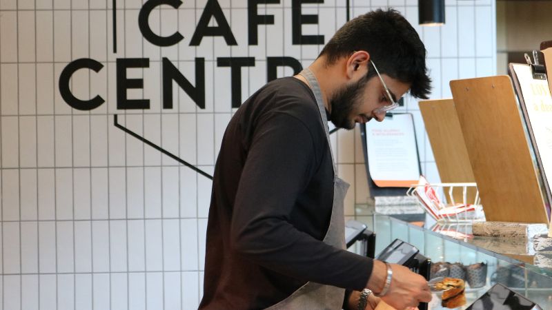 Student working in a cafe