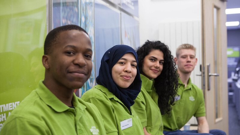 Student employees in Oxford Brookes polo shirts