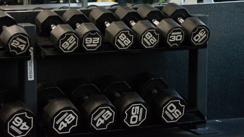 Dumbbells in gym