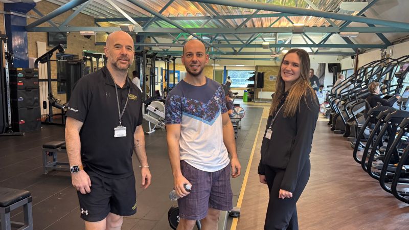 Staff and customers in the gym