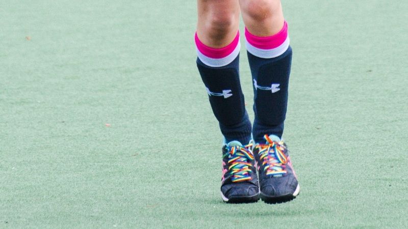 Hockey player wearing rainbow laces 