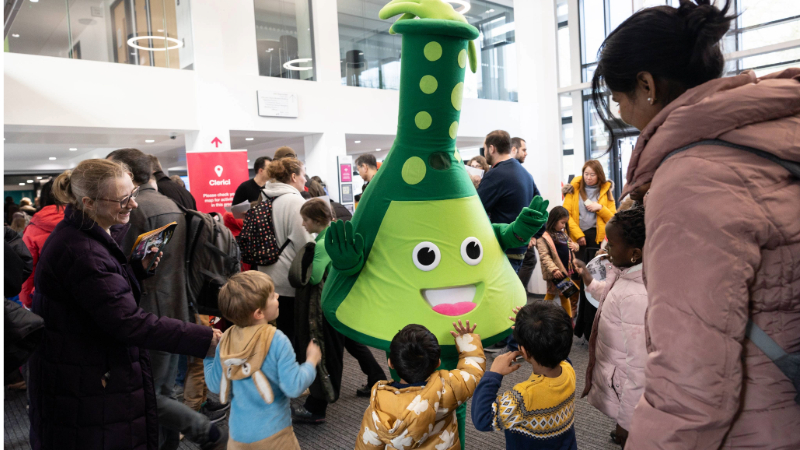 The Oxford Brookes Science Bazaar mascot “Brookie” greeting some visitors