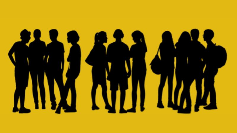 silhouettes of school children with a yellow background
