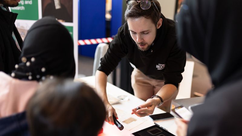 photo of a group of people interacting at a festival workshop