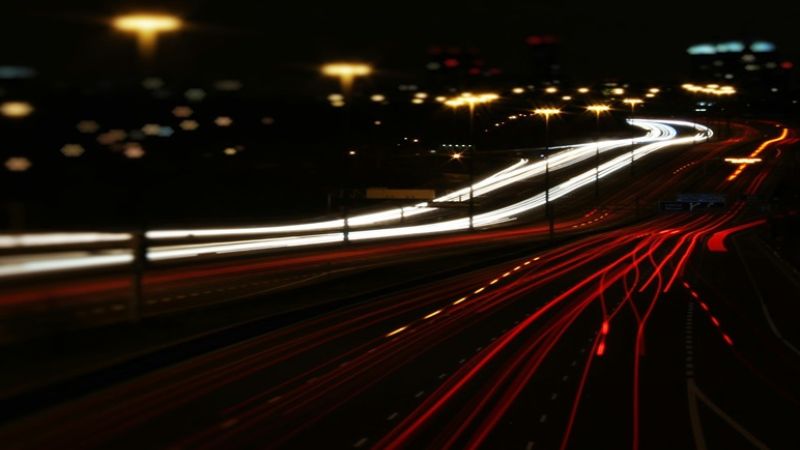 long exposure photo of traffic passing by