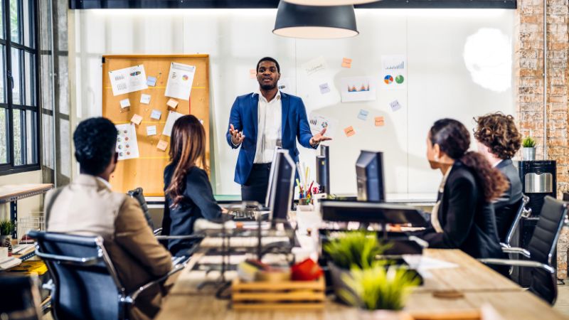 a diverse group of people around a table