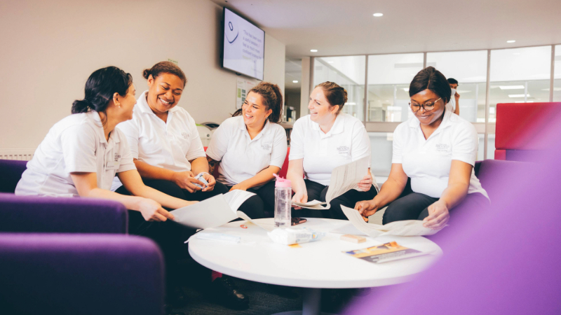 Students chatting on the Swindon Campus