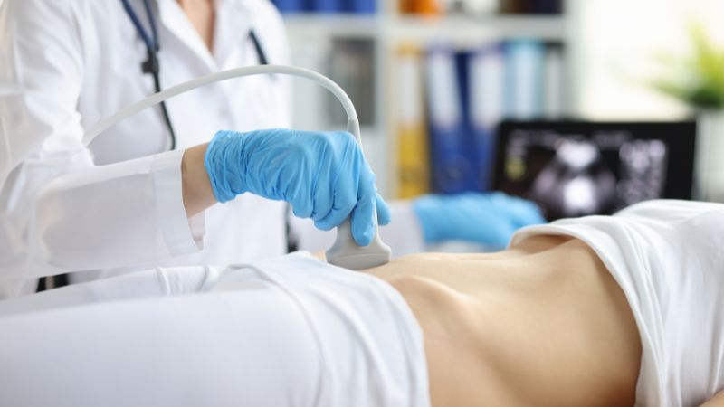 nurse examining a woman